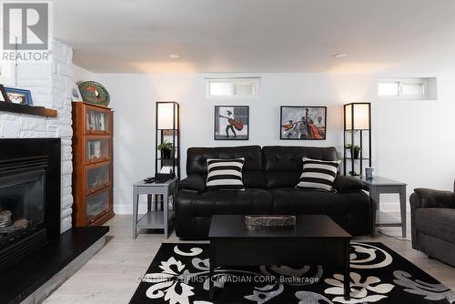 82 Queenston Crescent, London, ON - Indoor Photo Showing Living Room With Fireplace