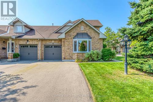 12 - 4275 Millcroft Park Drive, Burlington, ON - Outdoor With Facade