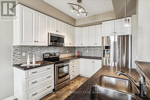 4 - 7 Lakelawn Road, Grimsby, ON - Indoor Photo Showing Kitchen With Stainless Steel Kitchen With Double Sink With Upgraded Kitchen