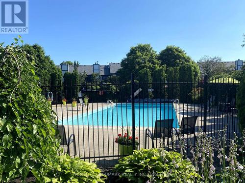 63 - 3050 Orleans Road, Mississauga, ON - Outdoor With In Ground Pool