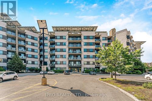 310 - 383 Main Street E, Milton, ON - Outdoor With Facade