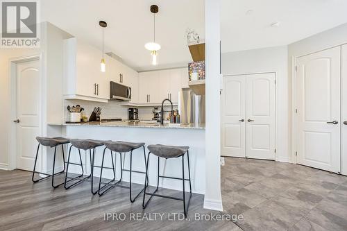 310 - 383 Main Street E, Milton, ON - Indoor Photo Showing Kitchen