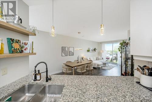 310 - 383 Main Street E, Milton, ON - Indoor Photo Showing Kitchen With Double Sink