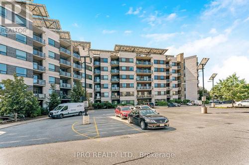 310 - 383 Main Street E, Milton, ON - Outdoor With Facade