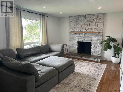 134 Eric Cres, Timmins, ON - Indoor Photo Showing Living Room With Fireplace