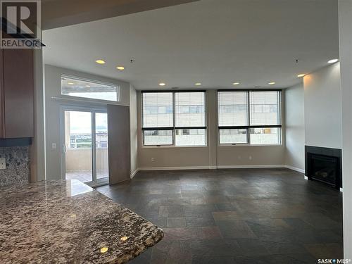 1203 1901 Victoria Avenue, Regina, SK - Indoor Photo Showing Other Room With Fireplace