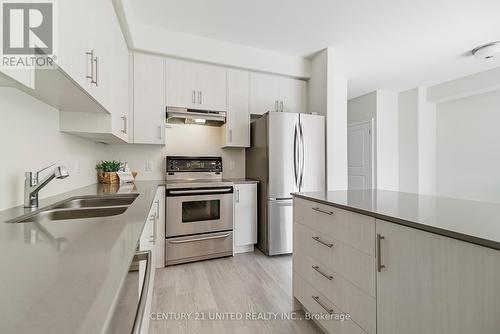 125 - 80 Marsh Avenue, Peterborough (Northcrest), ON - Indoor Photo Showing Kitchen With Double Sink