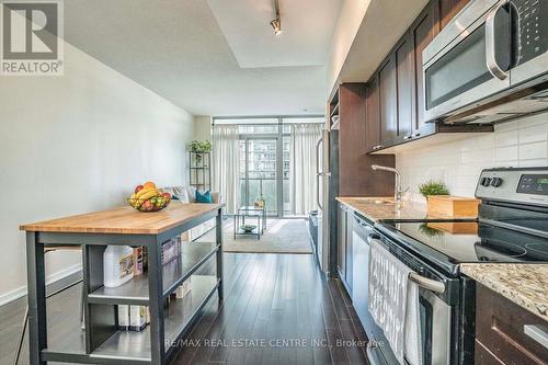 415 - 105 The Queensway Avenue, Toronto (High Park-Swansea), ON - Indoor Photo Showing Kitchen With Upgraded Kitchen