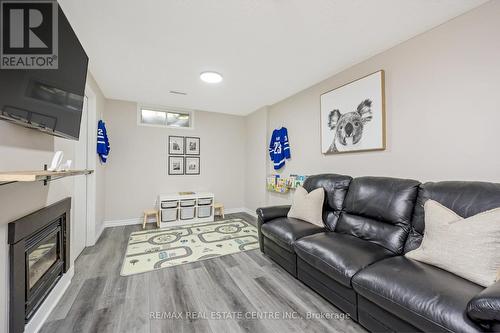 36 - 125 Sekura Crescent, Cambridge, ON - Indoor Photo Showing Living Room With Fireplace