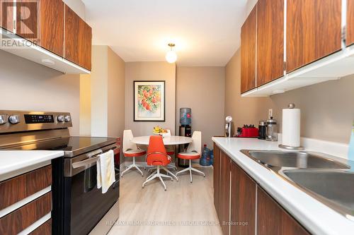 301 - 61 Richview Road, Toronto (Humber Heights), ON - Indoor Photo Showing Kitchen With Double Sink