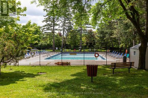 301 - 61 Richview Road, Toronto (Humber Heights), ON - Outdoor With In Ground Pool With Backyard