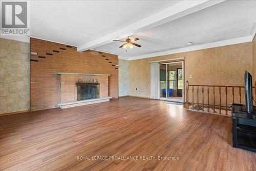 7163 Poplar Drive, Hamilton Township (Bewdley), ON - Indoor With Fireplace