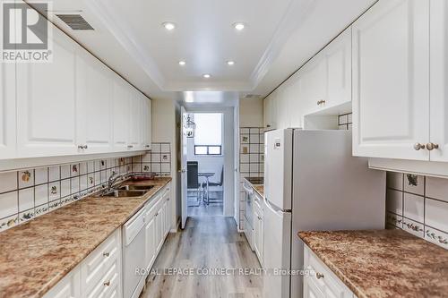 1908 - 75 Wynford Heights Crescent, Toronto, ON - Indoor Photo Showing Kitchen With Double Sink