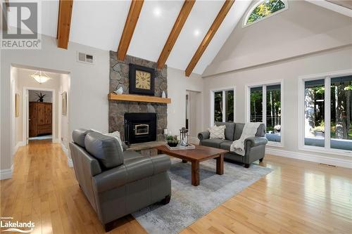 1259 Golf Course Road, Huntsville, ON - Indoor Photo Showing Living Room With Fireplace