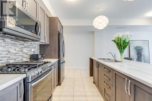 76 - 445 Ontario Street S, Milton, ON - Indoor Photo Showing Kitchen With Double Sink