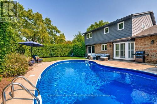 4235 Spruce Avenue, Burlington (Shoreacres), ON - Outdoor With In Ground Pool With Deck Patio Veranda With Backyard