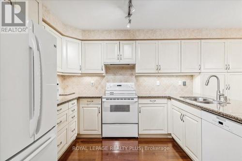 11 - 1735 The Collegeway, Mississauga, ON - Indoor Photo Showing Kitchen With Double Sink