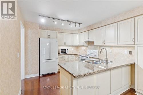 11 - 1735 The Collegeway, Mississauga (Erin Mills), ON - Indoor Photo Showing Kitchen With Double Sink