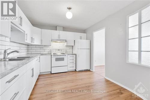 101 - 50 Emmerson Avenue, Ottawa, ON - Indoor Photo Showing Kitchen With Double Sink