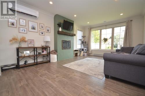 37 Hands Road, Cbs, NL - Indoor Photo Showing Living Room With Fireplace