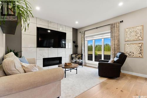 7 Stanford Road, White City, SK - Indoor Photo Showing Living Room With Fireplace