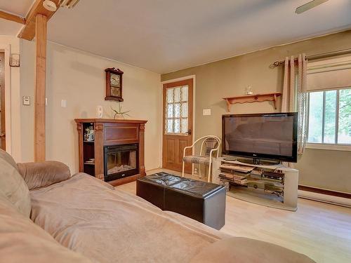 Salon - 189 Ch. Montcalm, Sainte-Marie-Salomé, QC - Indoor Photo Showing Living Room With Fireplace