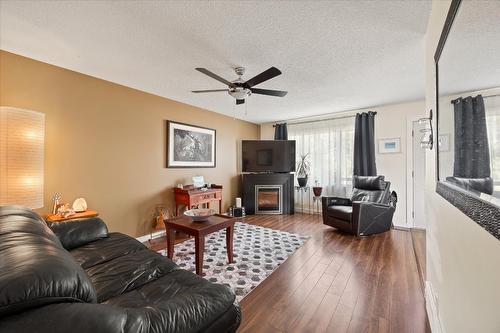 357 Holbrook Road, Kelowna, BC - Indoor Photo Showing Living Room With Fireplace