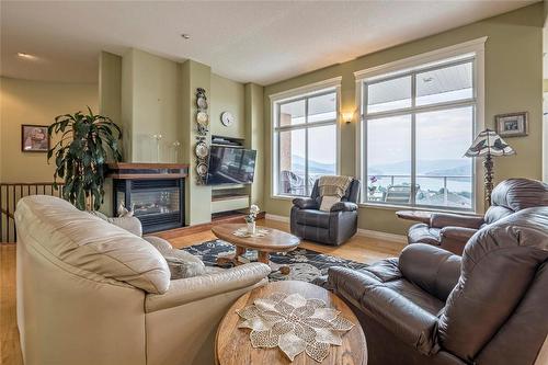 664 Mt York Drive, Coldstream, BC - Indoor Photo Showing Living Room With Fireplace