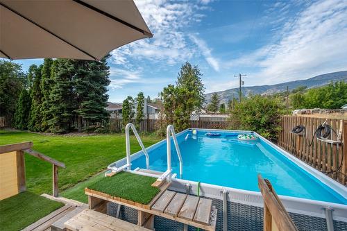 5545 Sawmill Road, Oliver, BC - Outdoor With Above Ground Pool With Deck Patio Veranda With Backyard