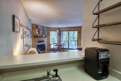 105-1191 Apex Mountain Road, Penticton, BC - Indoor With Fireplace