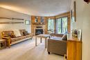 105-1191 Apex Mountain Road, Penticton, BC  - Indoor Photo Showing Living Room With Fireplace 