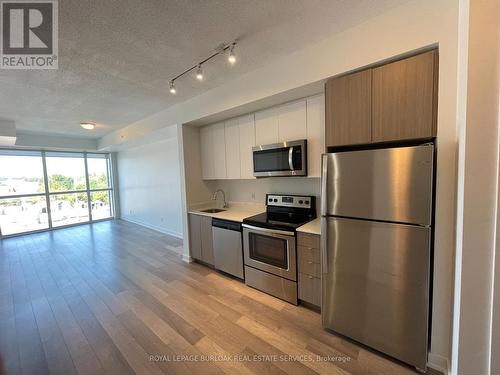 B407 - 5240 Dundas Street, Burlington, ON - Indoor Photo Showing Kitchen With Stainless Steel Kitchen