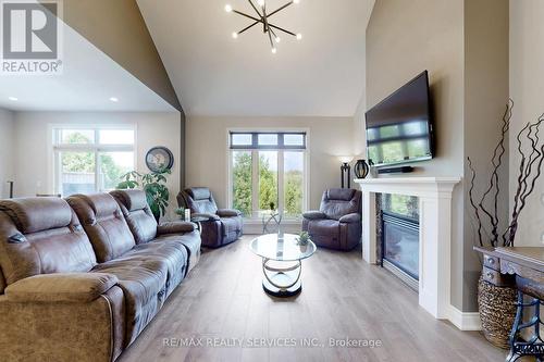 87 - 200 Kingfisher Drive, Mono, ON - Indoor Photo Showing Living Room With Fireplace