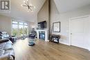 87 - 200 Kingfisher Drive, Mono, ON  - Indoor Photo Showing Living Room With Fireplace 