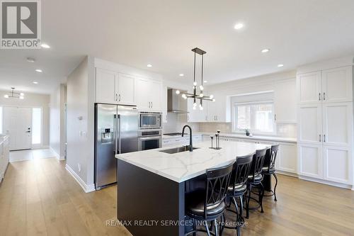 87 - 200 Kingfisher Drive, Mono, ON - Indoor Photo Showing Kitchen With Upgraded Kitchen