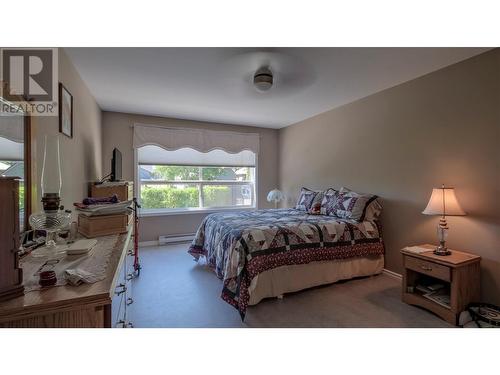 933 Harvey Avenue Unit# 101, Kelowna, BC - Indoor Photo Showing Bedroom