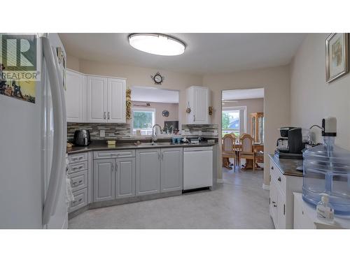 933 Harvey Avenue Unit# 101, Kelowna, BC - Indoor Photo Showing Kitchen With Double Sink