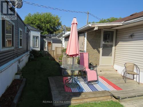 Front deck, entry in covered porch - 29 - 198 Springbank Drive, London, ON 