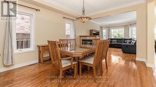 136 Van Scott Drive, Brampton (Northwest Sandalwood Parkway), ON - Indoor Photo Showing Dining Room With Fireplace