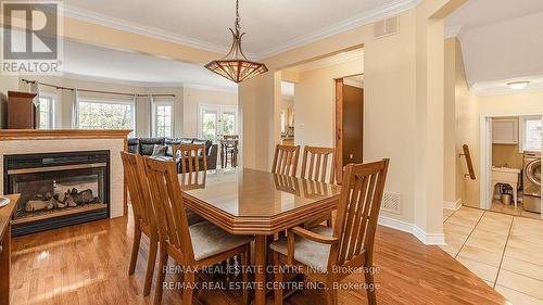 136 Van Scott Drive, Brampton (Northwest Sandalwood Parkway), ON - Indoor Photo Showing Dining Room With Fireplace