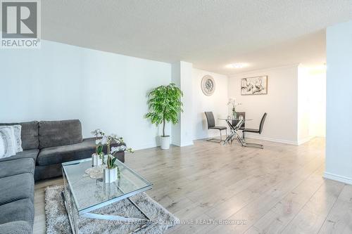 1406 - 3695 Kaneff Crescent, Mississauga, ON - Indoor Photo Showing Living Room