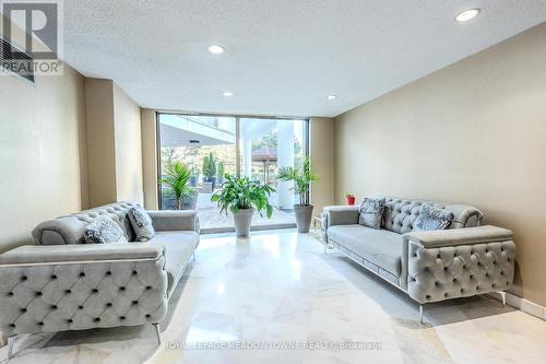 1406 - 3695 Kaneff Crescent, Mississauga, ON - Indoor Photo Showing Living Room