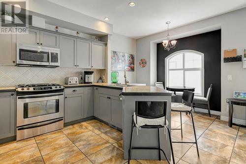 456 Mcphee Street Unit# 102, Kelowna, BC - Indoor Photo Showing Kitchen With Upgraded Kitchen