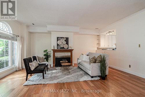 9 - 110 Mary Street W, Whitby (Downtown Whitby), ON - Indoor Photo Showing Living Room With Fireplace