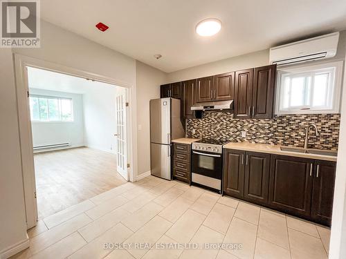 6 - 103 Coleman Avenue, Toronto (East End-Danforth), ON - Indoor Photo Showing Kitchen With Stainless Steel Kitchen With Double Sink