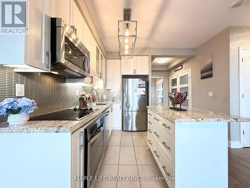 307 - 9090 Yonge Street, Richmond Hill (South Richvale), ON - Indoor Photo Showing Kitchen With Stainless Steel Kitchen With Upgraded Kitchen