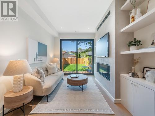 388 St Clarens Avenue, Toronto (Dufferin Grove), ON - Indoor Photo Showing Living Room With Fireplace