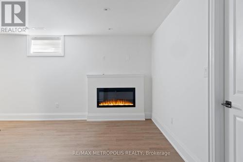 Lower - 79A Laburnham Avenue, Toronto (Long Branch), ON - Indoor With Fireplace