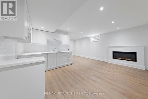 Lower - 79A Laburnham Avenue, Toronto (Long Branch), ON - Indoor With Fireplace