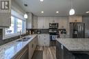 7639 Creekside Way, Prince George, BC  - Indoor Photo Showing Kitchen With Double Sink With Upgraded Kitchen 